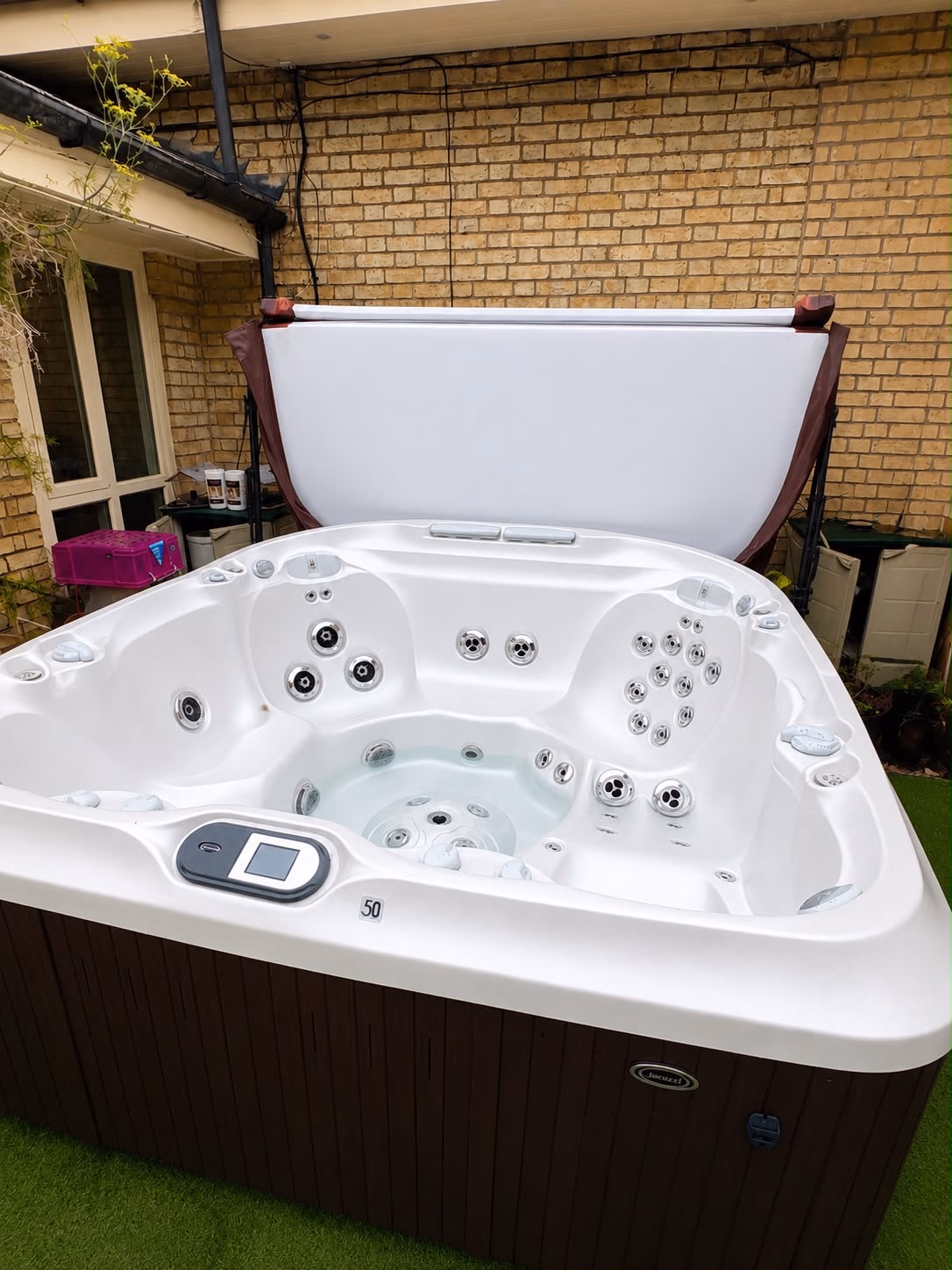 Clean Jacuzzi shell and fittings