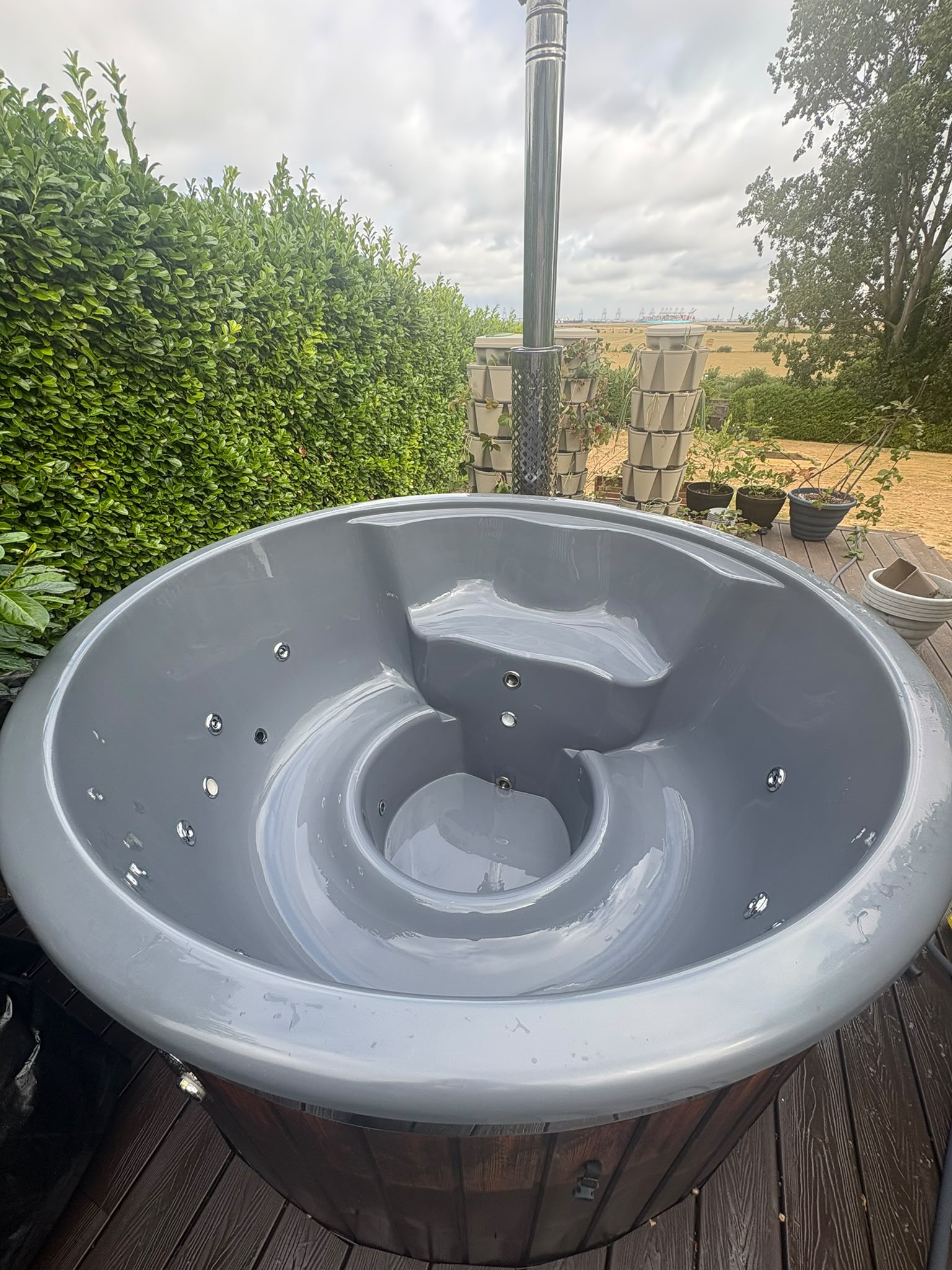 Freshly cleaned round hot tub shell