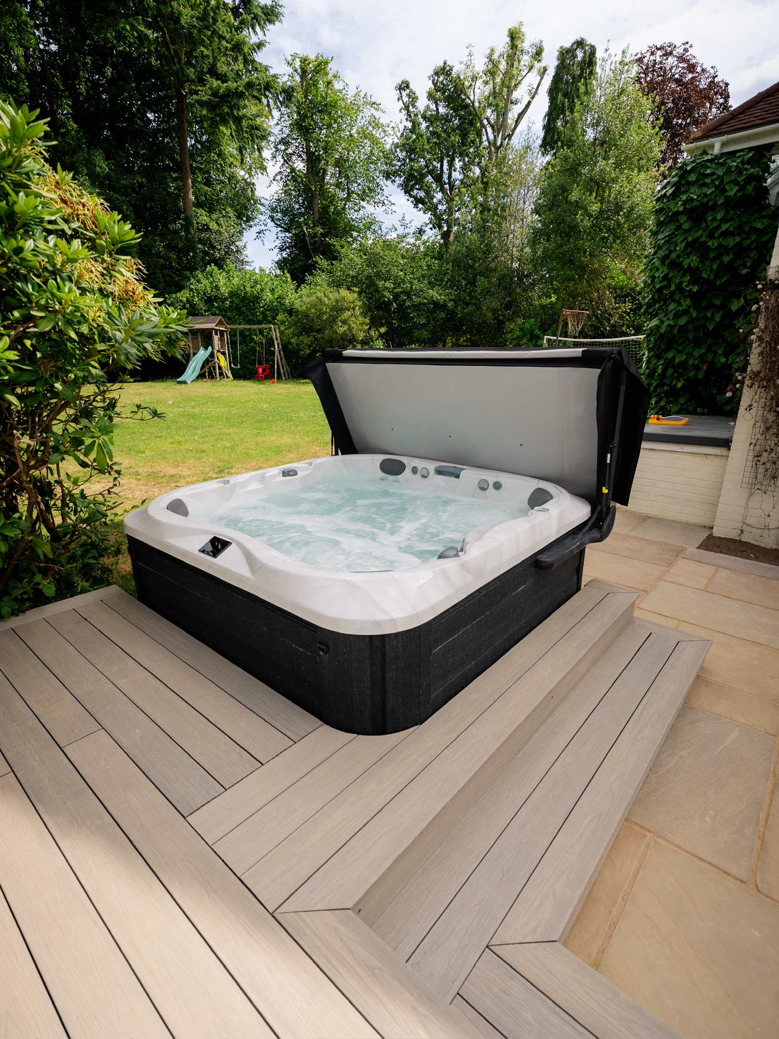 Garden hot tub cared for by J5 Spa Services